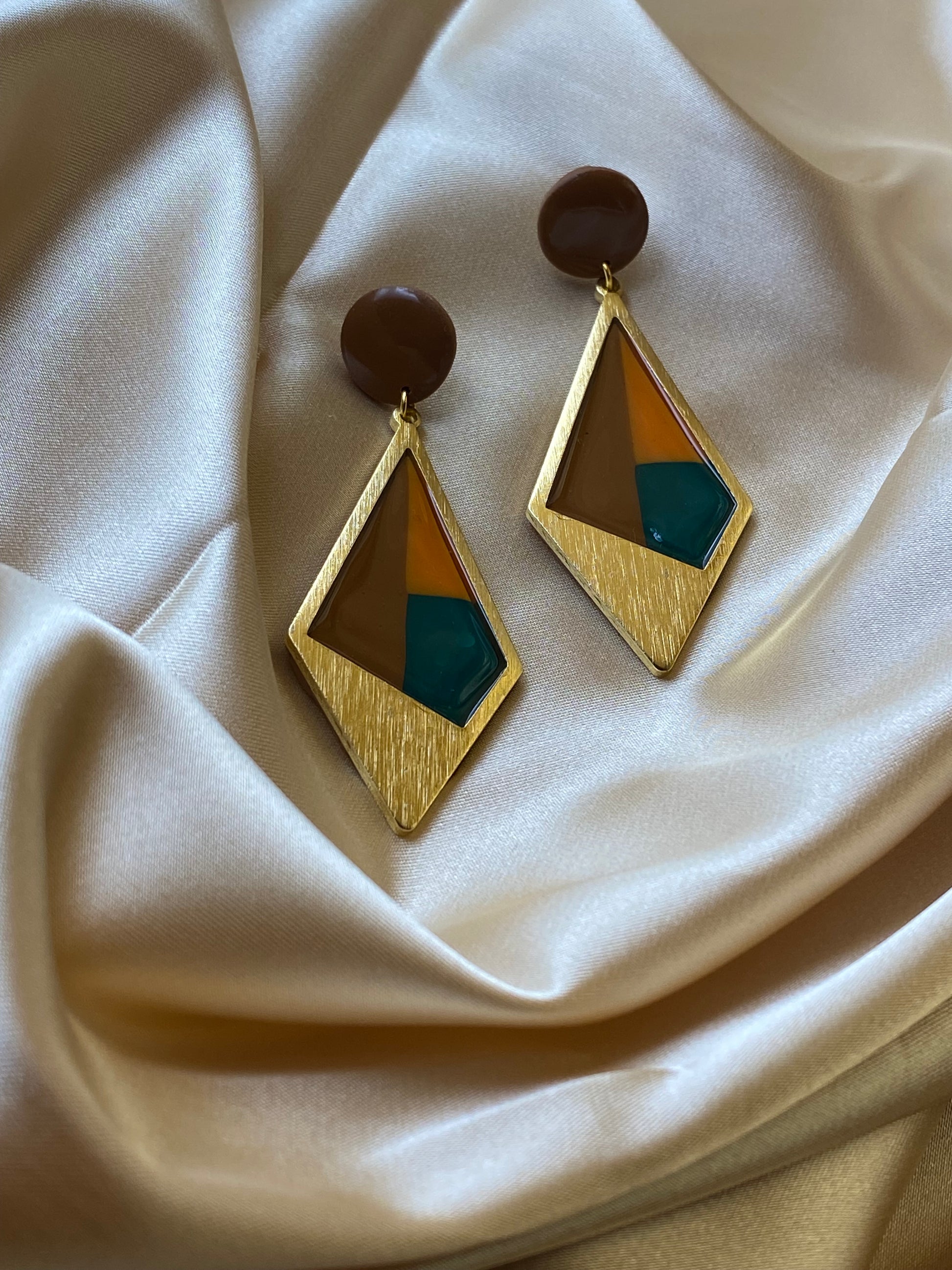 Handcrafted clay earrings, front side